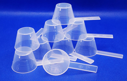 Műanyag mérőkanál